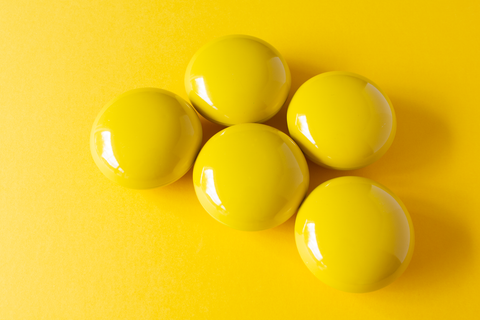 Metalen reuze Smarties geel - lot van 10 ex.