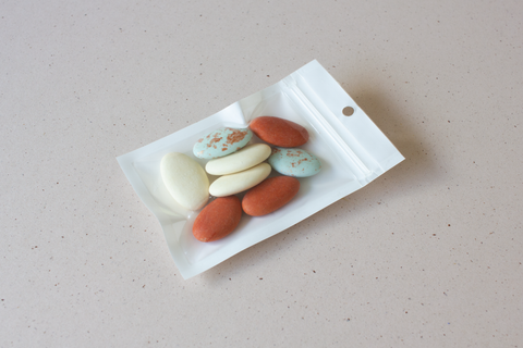 Wit zakje met transparante voorkant